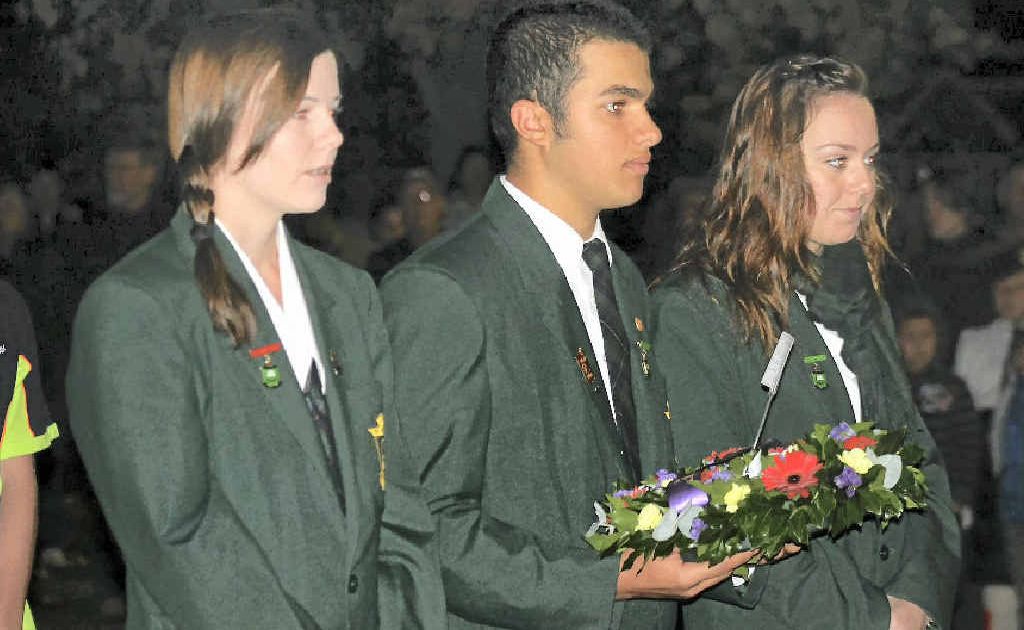 DAWN SERVICE: (from left) St Joseph’s school leaders Stephanie Wilmot, Peter Gasparin and Emma Boccari about to lay a wreath. DAWN SERVICE: (from left) St Joseph’s school leaders Stephanie Wilmot, Peter Gasparin and Emma Boccari about to lay a wreath.